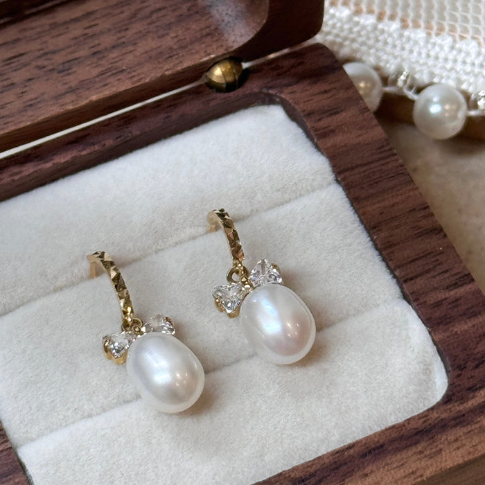 10K Yellow Gold Bow Freshwater Cultured Pearl Earring