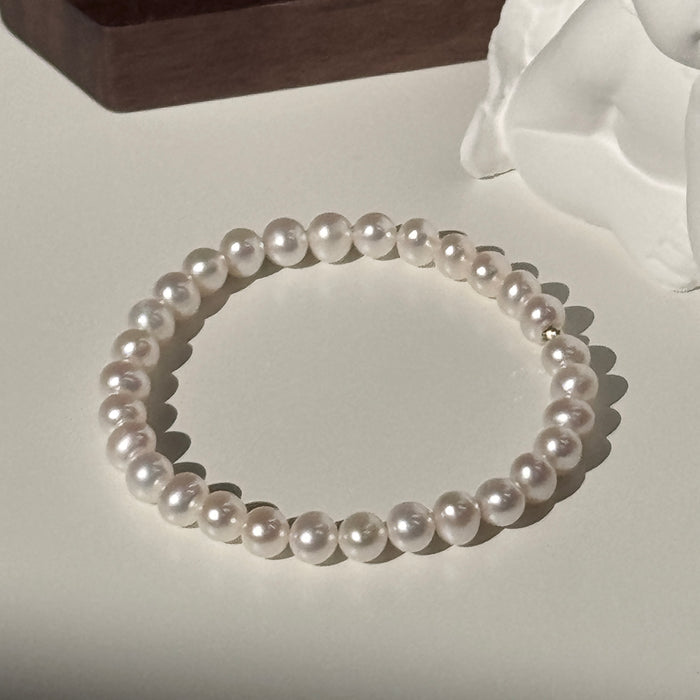 14K Yellow Gold White Freshwater Pearl Bracelet